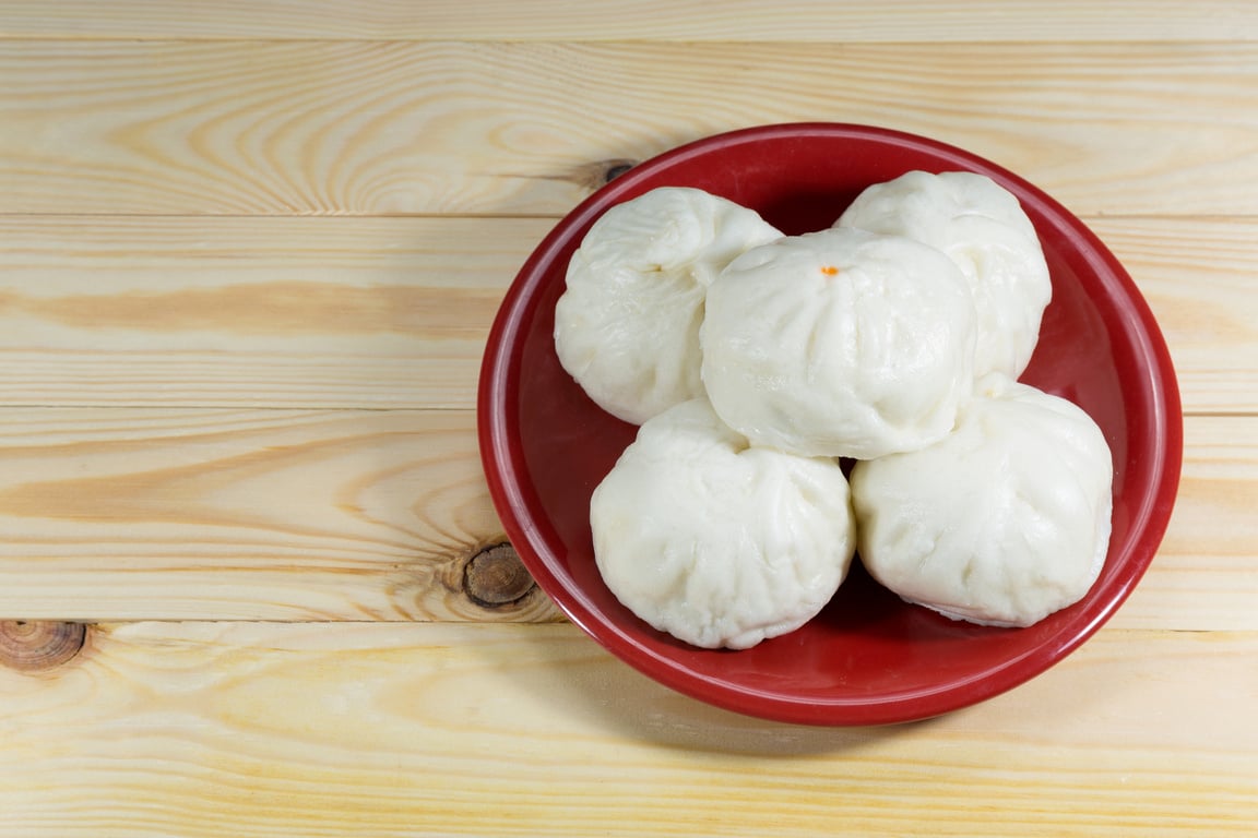 Char Siu Bao - Chinese steamed bun on dish